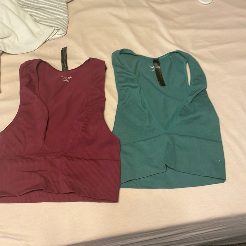 Out from under Urban Outfitters tops